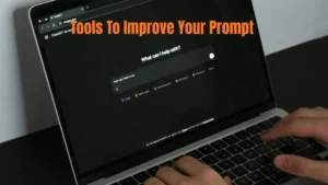 A person typing in chatgpt with words "Tools to improve AI prompt."